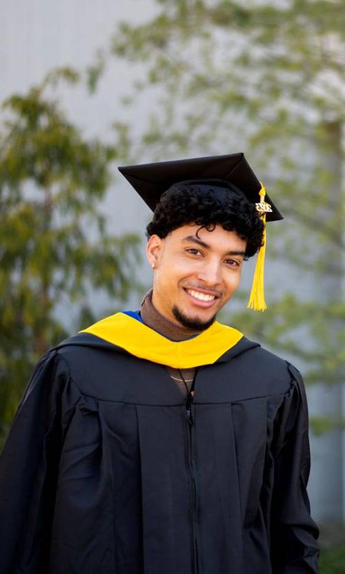 GVSU graduate student at commencement.